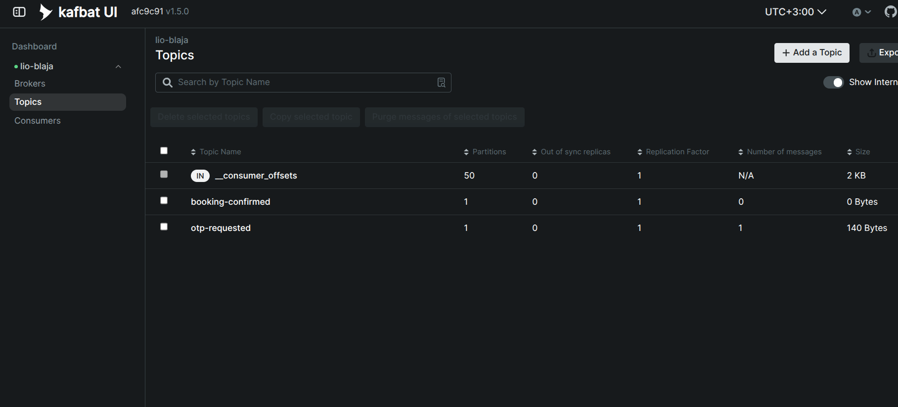 Kafka UI showing the booking-confirmed and otp-requested topics